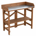 Gartenarbeitstisch 117 x 45 x 122 cm aus Holz Braun mit verzinkter Arbeitsfläche und Ablage